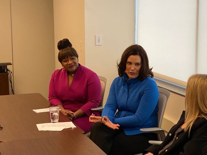 Gov. Gretchen Whitmer (right) speaks during a roundtable discussion on the price of prescription drugs on Thursday, Jan. 23, in Grand Rapids. (Arpan Lobo/Sentinel Staff)