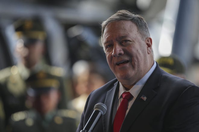 U.S. Secretary of State Mike Pompeo speaks during a visit to an anti-narcotics police base Tuesday in Bogota, Colombia. [Ivan Valencia/The Associated Press]