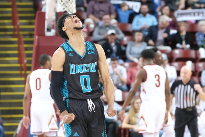 UNCW’s Ty Gadsden reacts during the Seahawks 72-70 road win over Charleston. [AL SAMUELS/CofC ATHLETICS]
