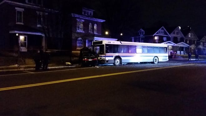A westbound COTA bus crashed into the side of a car in the 1300 block of East Long Street on Sunday night. One person was taken in life-threatening condition to OhioHealth Grant Medical Center. [Jim Woods/Dispatch]