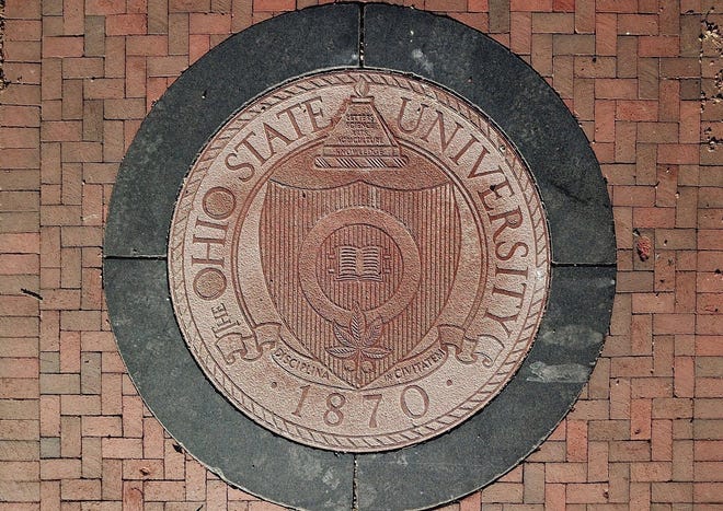 The Ohio State University seal at the East entrance to the Oval. [Doral Chenoweth III/Dispatch file photo]