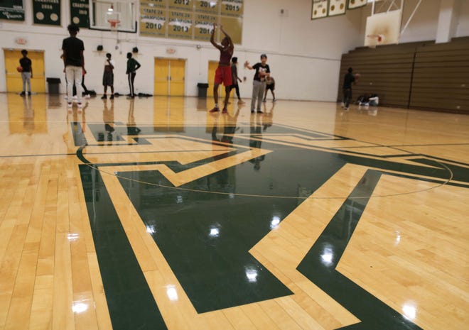 Kinston High School students play half-court basketball Monday morning, Jan. 27, at the school’s gym. [Brandon Davis/Kinston Free Press]