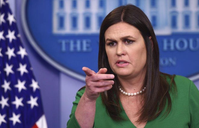 White House press secretary Sarah Huckabee Sanders calls on a reporter during the daily briefing at the White House in Washington, Monday, April 9. Sanders was asked about Syria, Russia and other topics. [ SUSAN WALSH / AP ]