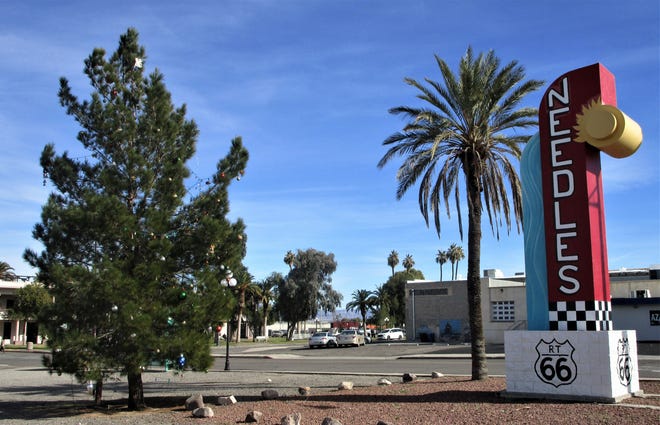Christmas trees and Palm trees greeted the visitor to Needles. [COURTESY OF JOHN R. BEYER]