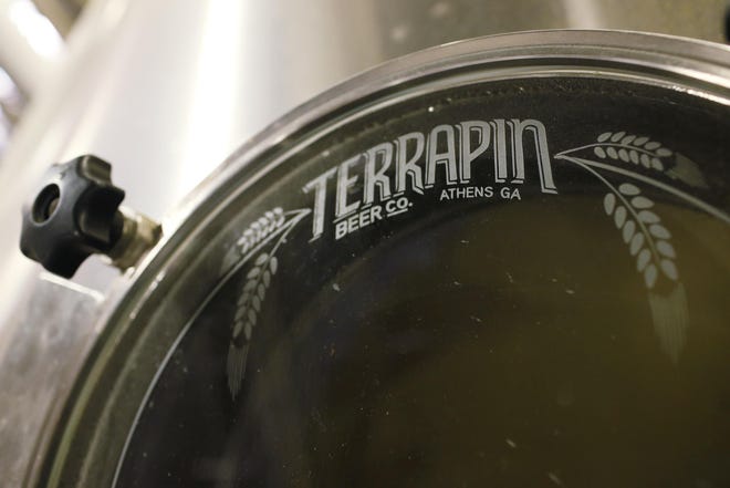 FILE - The top opening to Terrapins 100 barrel brewhouse mash tun where all of Terrapins creations start out in Athens, Ga., on Friday, Aug. 11, 2017. Terrapin is set to install solar panels at it brewery in Athens. [Photo/Joshua L. Jones, Athens Banner-Herald]