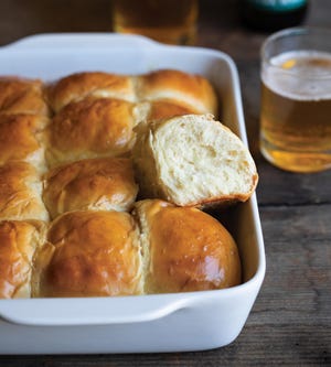 Tropical wheat beer adds a punch of flavor to these Hawaiian-style sweet yeast rolls. The recipe is from Lori Rice’s new book, “Beer Bread.” [Contributed by Lori Rice]