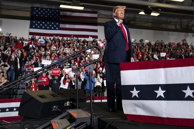 President Donald Trump arrives to speak at a campaign rally at the Wildwoods Convention Center Oceanfront, Tuesday, Jan. 28, 2020, in Wildwood, N.J. (AP Photo/ Evan Vucci)