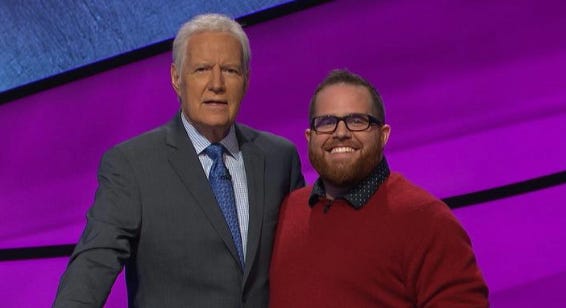 Tallahasseean Gregory Bacon, who will appear on "Jeopardy!," poses with Alex Trebec. (Photo: Tallahassee Democrat files)