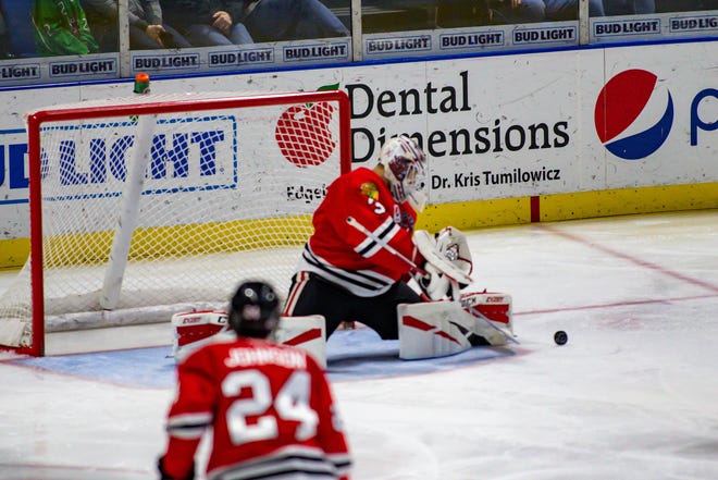 Matt Tomkins, shown making one of his 30 saves last Wednesday during a 1-0 IceHogs loss, signed a two-year contract with the Hogs and Chicago Blackhawks the next day, carrying him through the 2020-21 season. [PHOTO PROVIDED BY ROCKFORD ICEHOGS]