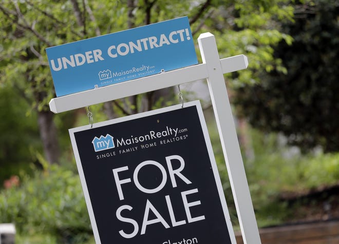 Home sales surged in December in the Sarasota-Manatee region. [AP Photo/Chuck Burton, File]