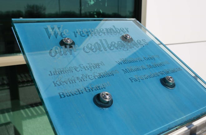 A memorial plaque at West Pharmaceutical Services, located at 1028 Innovation Way in Kinston, lists the names of the six employees killed in the plant’s explosion on January 29, 2003. [Brandon Davis/Kinston Free Press]