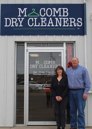 Business owners Eric and Karen Blakeley stand in front of the newly-reopened Macomb Dry Cleaners 2.0. [FELICIA SELMON/THE VOICE]