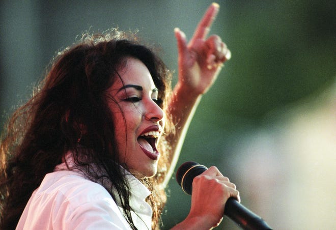 ** FILE ** Selena performs at Hemisfair Plaza in San Antonio, TX, April 24, 1994. Photo by Sung Park / The Austin American-Statesman.