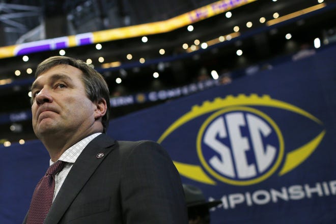 Georgia coach Kirby Smart arrives at Mercedes-Benz Stadium before the start of the Southeastern Conference Championship. [Photo/Joshua L. Jones, Athens Banner-Herald]