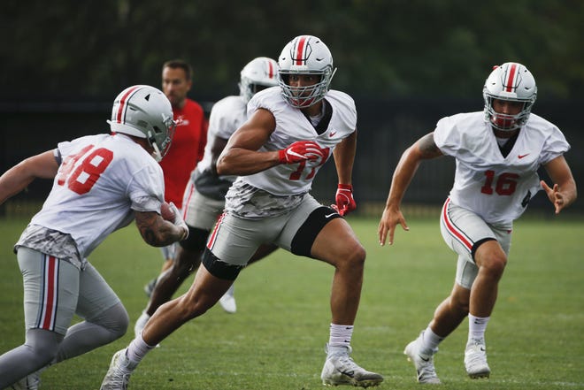 Defensive lineman Alex Williams (17), shown here in a practice in August, played in six games for Ohio State and will transfer to Vanderbilt. [Joshua A. Bickel/Dispatch]