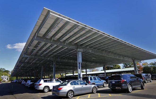 The solar panels at the West Hingham commuter rail lot on Fort Hill Street still have not generated any electricity. [Greg Derr/The Patriot Ledger]