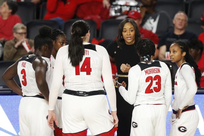Georgia coach Joni Taylor speaks with her team during a timeout during a game earlier this season. [Photo/Joshua L. Jones, Athens Banner-Herald]