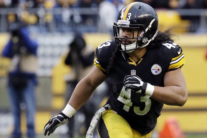 Steelers' safety Troy Polamalu in action against the Buffalo Bills in 2013 in Pittsburgh. Polamalu was elected into the Pro Football Hall of Fame on Saturday. [AP File Photo/Gene J. Puskar]