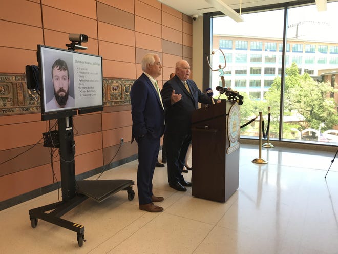 File - Lehigh County District Attorney James Martin, right, and Bucks County District Attorney Matthew Weintraub speak during a news conference about sexual assault charges against former Palisades High School teacher Christian Willman. [ANTHONY DIMATTIA / STAFF PHOTOJOURNALIST]