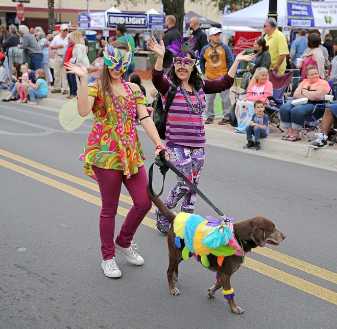 The Leesburg Partnership is looking for owners and their furry, feathered or scaly friends to walk in its upcoming Mardi Gras pet parade. [Daily Commercial File]
