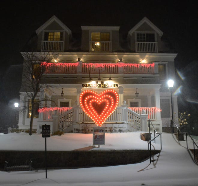 The Grand Hotel in Lower Village Kennebunk is decked out in red lights as part of Paint the Town Red month of festivities throughout the Kennebunks. [Robert Dennis photo]