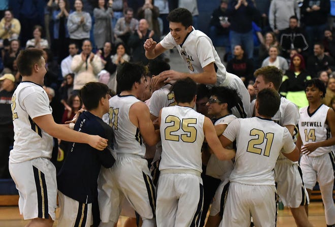 Hopewell players celebrate their win over Beaver Tuesday at Hopewell High School. [Lucy Schaly/For BCT]