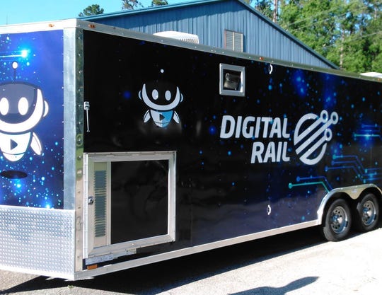 An exterior image of TCC's Digital Rail, a 26-foot mobile unit equipped with the latest technologies used to expose students to robotics, cyber security and 3-D printing. [Photo: Tallahassee Community College]