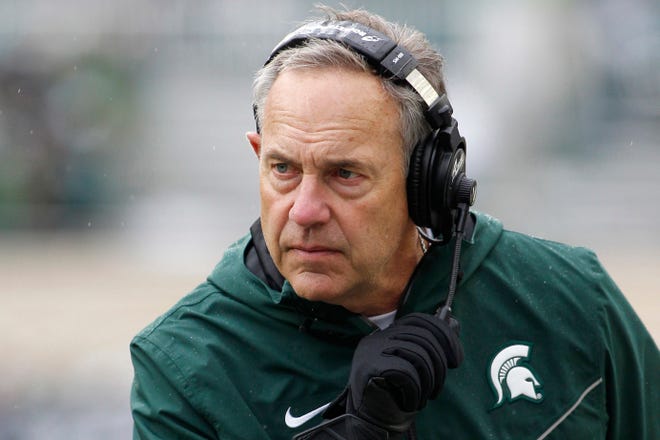 Mark Dantonio went 114-57 as Michigan State's coach and won Big Ten titles in 2010, 2013 and 2015. The last of those three seasons included a trip to the College Football Playoff, but the Spartans declined after that. They went 7-6 this past season. [AP Photo/Al Goldis, 2018]