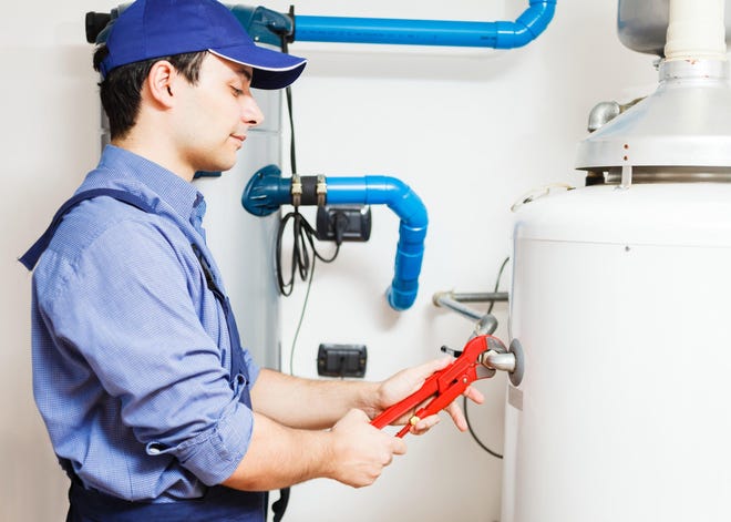Regular flushing and draining is an essential element of water heater maintenance. [TRIBUNE NEWS SERVICE]