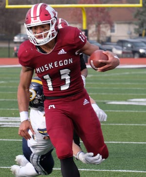 Cameron Martinez, who signed with Ohio State on Wednesday, played offense and defense in high school in Muskegon, Mich. [Robert Killips/Lansing State Journal]