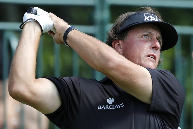 Phil Mickelson, who turns 50 on June 16, would be eligible to play in this summer's U.S. Senior Open at Newport Country Club. [ASSOCIATED PRESS FILE PHOTO]