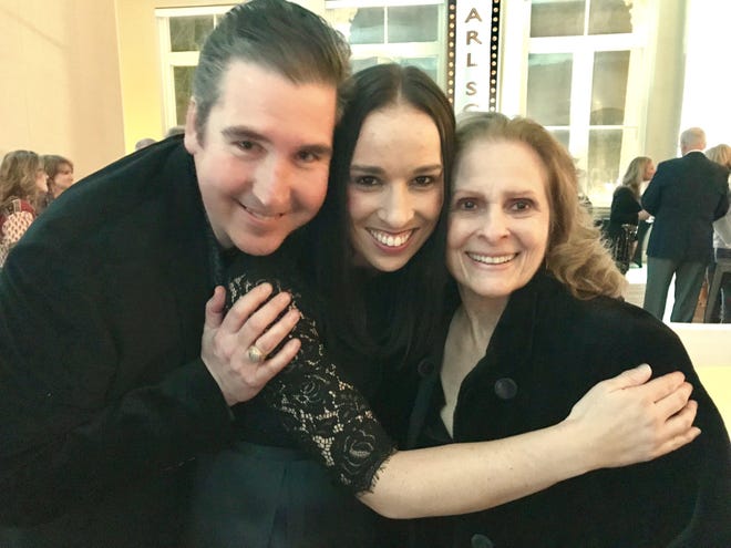 Bobbi Gibson, right, widow of Country Music Hall of Fame member Don Gibson, visits with recording artists Darin and Brooke Aldridge on Feb. 1 at a reception for the “Remembering Earl” concert. [Wade Allen/The Shelby Star]