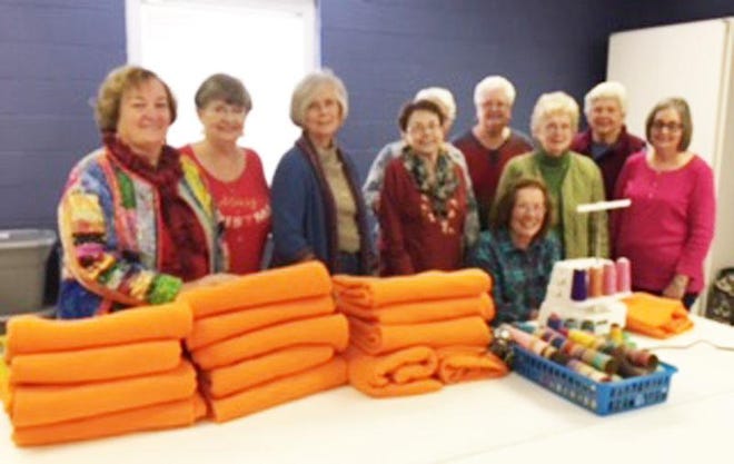 Pictured left to right are Kathy Tucker (project chair), Norma Daniels, Margie Suggs, Ann Riggerio, Brenda Powell, Allene Trachte, Kathy Hart, Betty Haynes, Marie Stokes, and Sandy Rutledge.
