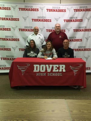 Dover senior Alana Belknap recently signed a full athletic scholarship with Davis & Elkins to continue her academic and basketball career. Davis & Elkins is a member of the Division II Mountain East Conference. Pictured between Alana are her mother Jennifer Belknap and father Brent. Standing are her coaches Allen Wertz and Troy McClellan. Submitted photo