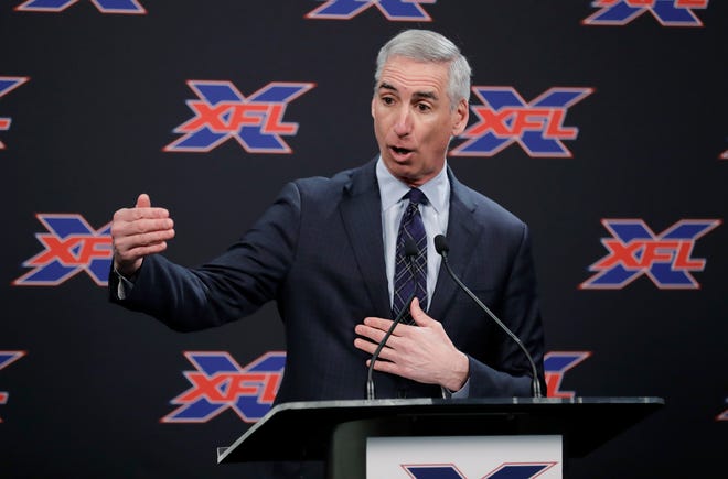 FILE - In this Feb. 25, 2019, file photo, XFL Commissioner Oliver Luck gestures during a press conference in Seattle. When the XFL debuts in February, it will take a â€œStar Trekâ€ approach of going where no football league has gone before. (AP Photo/Ted S. Warren, File)
