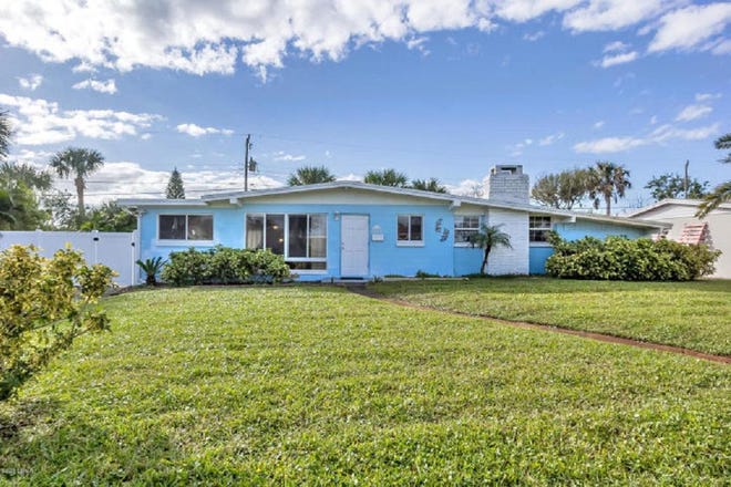 This solid-concrete-block pool home rests on a rare, oversized lot, less than a block from the ocean, in Ormond-by-the-Sea. [Realty Pros Assured]