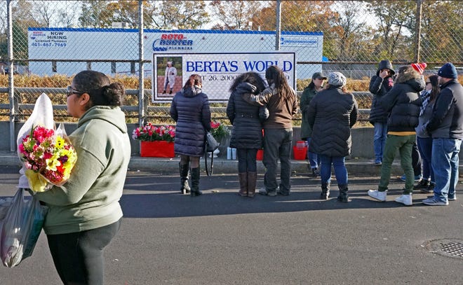 Family members and friends gather in November at a vigil in honor of Berta Pereira-Roldan.

(The Providence Journal / Sandor Bodo)