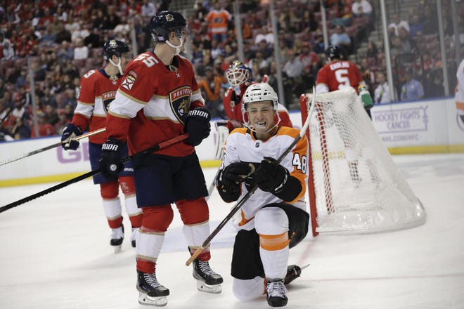 The Flyers' Morgan Frost celebrates after scoring a goal against the Panthers. [LYNNEE SLADKY / ASSOCIATED PRESS FILE]