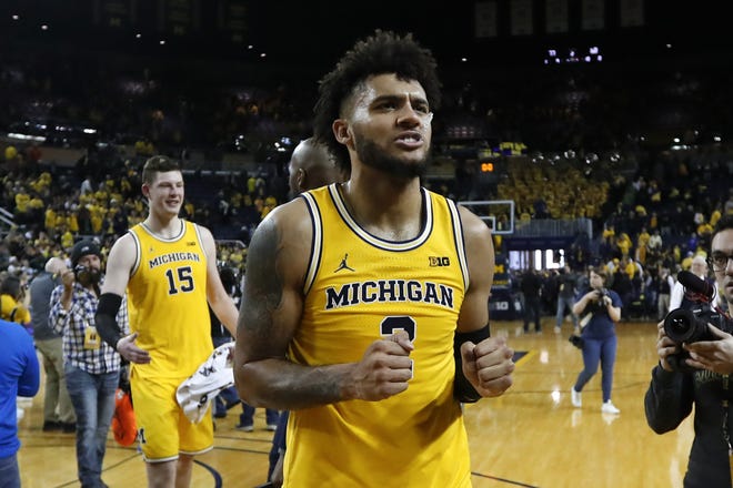 Michigan forward Isaiah Livers reacts to beating Michigan State 77-68 in an NCAA college basketball game in Ann Arbor, Mich., Saturday, Feb. 8, 2020.(AP Photo/Paul Sancya)