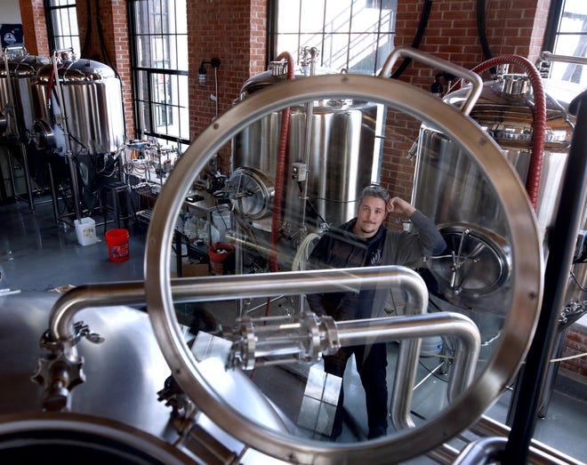 Justin Tisdale, head brewer at Apponaug Brewing Co. in Warwick, says scrutiny from the city Sewer Authority forced him to spend thousands of dollars on new equipment, and to spend a huge amount of time trying to understand city regulations. [The Providence Journal / Kris Craig]