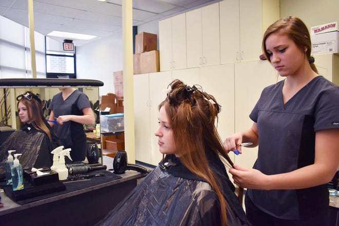 Herkimer-Fulton-Hamilton-Otsego BOCES Cosmetology student Madison Szczesniak, a senior at West Canada Valley, works in the program’s clinic, Salon Illusions, on Jan. 23 doing the hair of her sister, West Canada Valley senior Caity Szczesniak. Salon Illusions is open to local community members by appointment only. Call 315-867-2043 for information or to make an appointment. [SUBMITTED PHOTO]