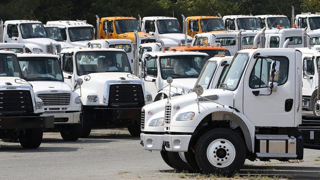 New Freightliner trucks lined up at the Daimler Mount Holly Truck Manufacturing plant. [JOHN CLARK/THE GASTON GAZETTE]