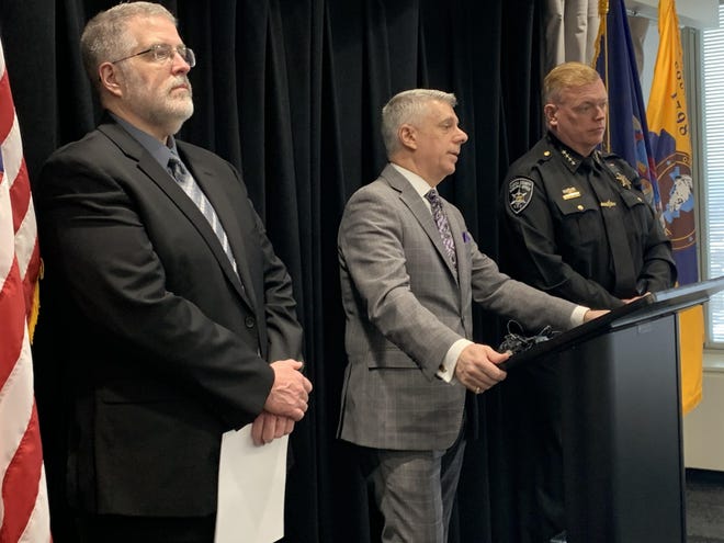From left, Bob Pronteau, assistant county attorney, Oneida County Executive Anthony Picente Jr. and Oneida County Sheriff Rob Maciol announce a local law to catch and punish people that pass stopped school buses. [EDWARD HARRIS / OBSERVER-DISPATCH]