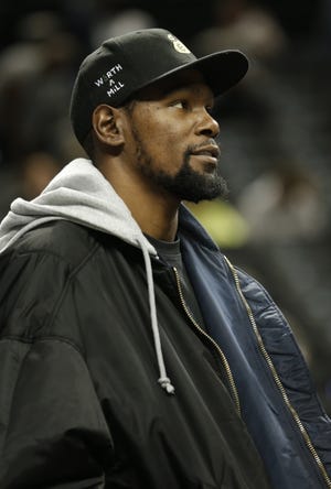 Former Thunder star Kevin Durant, now with the Brooklyn Nets, thinks Oklahoma City basketball fans are fixated on him, but it might be the other way around. [Nicole Sweet/USA TODAY Sports]