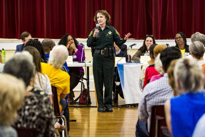 Sheriff Sadie Darnell addresses questions about crime during a Town Hall meeting at the Thelma Boltin Center in April 2019. [Gainesville Sun file]