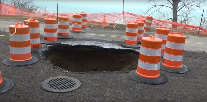 A 10-feet wide, 8-feet deep sinkhole forced the indefinite closure of part of Lake Shore Drive in Saugatuck. High wave levels and storms expanded the sinkhole since its formation as a pothole in early December. [WZZM TV-13]