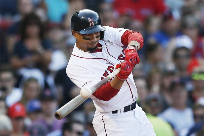 Outfielder Mookie Betts was traded away exactly 100 years after the Red Sox dealt Babe Ruth, but this won't be another Curse of the Bambino. [ASSOCIATED PRESS FILE PHOTO]