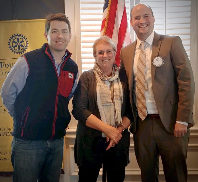 Hamilton Rotary member Liam McDevitt, left, hosted Thought Into Action director Mary Galvez, center, at the Rotary‘s Jan. 30 meeting. They are joined by Hamilton Rotary president Matt Norris. [COURTESY SEAN NEVISON]