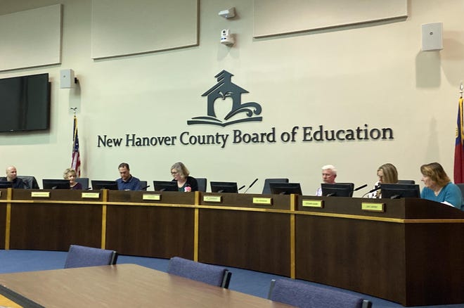 The New Hanover County Board of Education gives a brief statement following a closed session meeting Tuesday about the search for an interim and permanent superintendent. [HUNTER INGRAM/STARNEWS]