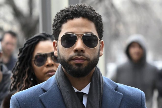 FILE - In this March 14, 2019, file photo, Empire actor Jussie Smollett arrives at the Leighton Criminal Court Building for his hearing in Chicago. Smollett faces new charges for reporting an attack that Chicago authorities contend was staged to garner publicity, according to media reports Tuesday, Feb. 11, 2020. The charges include disorderly conduct counts, according to the reports that cite unidentified sources. (AP Photo/Matt Marton, File)